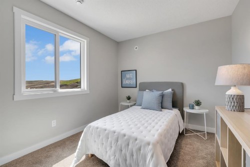 3 Tillotson Downs, Okotoks, AB - Indoor Photo Showing Bedroom