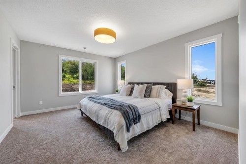 3 Tillotson Downs, Okotoks, AB - Indoor Photo Showing Bedroom