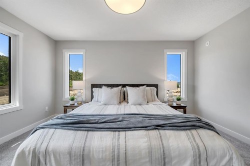 3 Tillotson Downs, Okotoks, AB - Indoor Photo Showing Bedroom