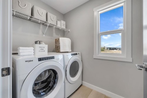 3 Tillotson Downs, Okotoks, AB - Indoor Photo Showing Laundry Room