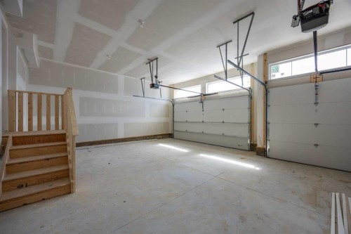 460 Discovery Place Sw, Calgary, AB - Indoor Photo Showing Garage