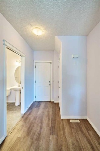 153 Royal Birch Bay Nw, Calgary, AB - Indoor Photo Showing Other Room