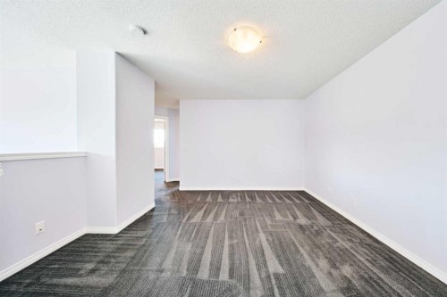 153 Royal Birch Bay Nw, Calgary, AB - Indoor Photo Showing Other Room