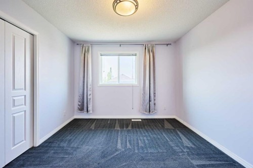 153 Royal Birch Bay Nw, Calgary, AB - Indoor Photo Showing Other Room