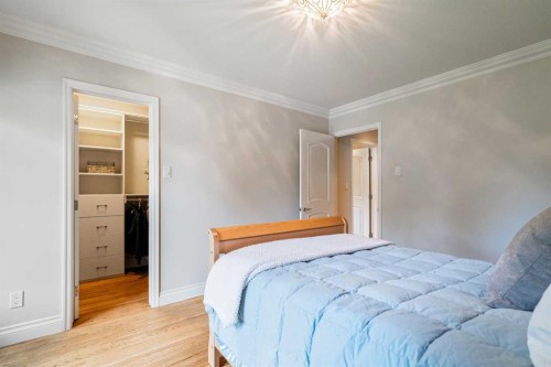 10819 Willowfern Drive Se, Calgary, AB - Indoor Photo Showing Bedroom
