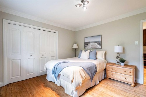10819 Willowfern Drive Se, Calgary, AB - Indoor Photo Showing Bedroom