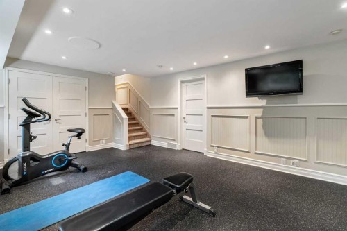 10819 Willowfern Drive Se, Calgary, AB - Indoor Photo Showing Gym Room