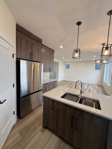 71 Vincent Crescent, Olds, AB - Indoor Photo Showing Kitchen With Double Sink