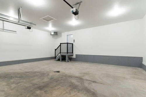 58 Vincent Crescent, Olds, AB - Indoor Photo Showing Garage