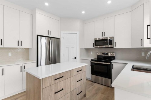 58 Vincent Crescent, Olds, AB - Indoor Photo Showing Kitchen With Double Sink With Upgraded Kitchen