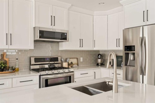 4331 Elgin Avenue Se, Calgary, AB - Indoor Photo Showing Kitchen With Double Sink With Upgraded Kitchen