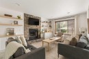 4331 Elgin Avenue Se, Calgary, AB  - Indoor Photo Showing Living Room With Fireplace 