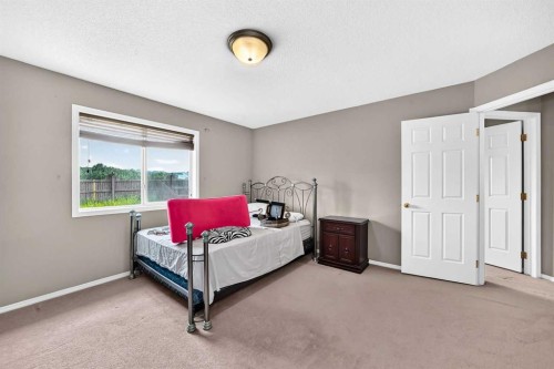163 Valley Crest Close Nw, Calgary, AB - Indoor Photo Showing Bedroom