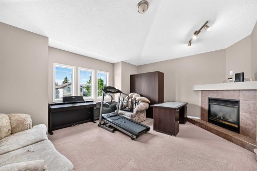 163 Valley Crest Close Nw, Calgary, AB - Indoor With Fireplace