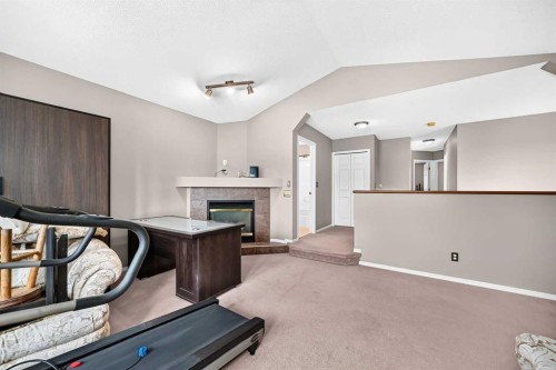 163 Valley Crest Close Nw, Calgary, AB - Indoor With Fireplace