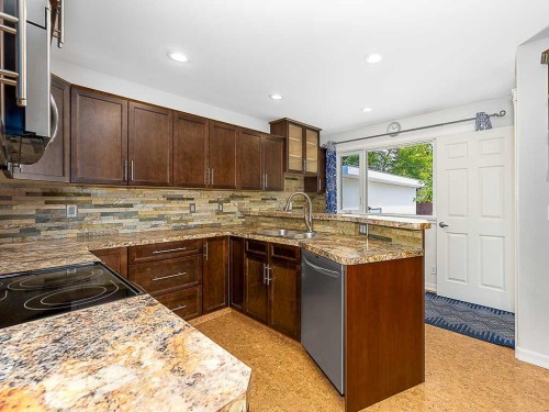 6312 Elbow Drive Sw, Calgary, AB - Indoor Photo Showing Kitchen With Double Sink