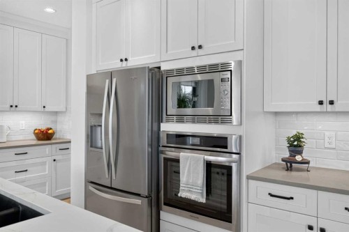 16 Legacy Manor Se, Calgary, AB - Indoor Photo Showing Kitchen With Upgraded Kitchen