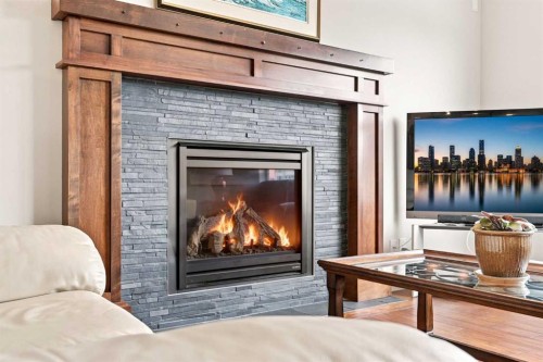 14 Ridge View Place, Cochrane, AB - Indoor Photo Showing Living Room With Fireplace