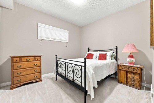14 Ridge View Place, Cochrane, AB - Indoor Photo Showing Bedroom