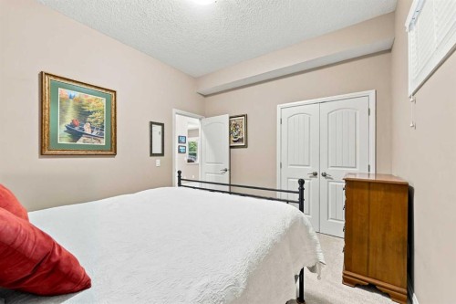 14 Ridge View Place, Cochrane, AB - Indoor Photo Showing Bedroom
