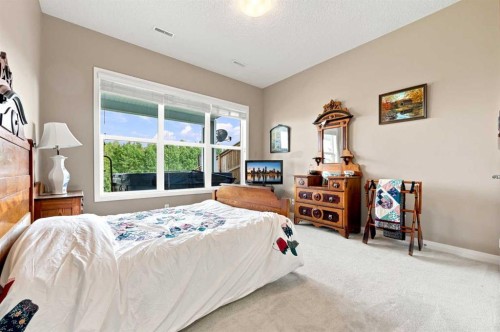 14 Ridge View Place, Cochrane, AB - Indoor Photo Showing Bedroom
