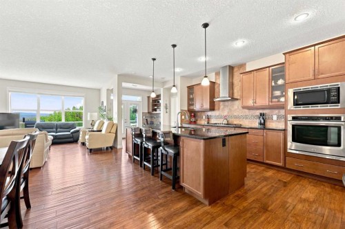 14 Ridge View Place, Cochrane, AB - Indoor Photo Showing Kitchen With Stainless Steel Kitchen With Upgraded Kitchen
