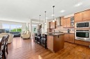 14 Ridge View Place, Cochrane, AB  - Indoor Photo Showing Kitchen With Stainless Steel Kitchen With Upgraded Kitchen 