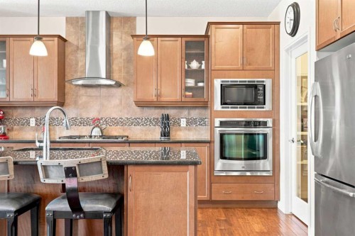 14 Ridge View Place, Cochrane, AB - Indoor Photo Showing Kitchen With Stainless Steel Kitchen With Upgraded Kitchen