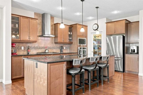 14 Ridge View Place, Cochrane, AB - Indoor Photo Showing Kitchen With Stainless Steel Kitchen With Upgraded Kitchen