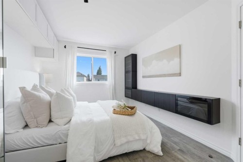 96 Rivercrest Crescent Se, Calgary, AB - Indoor Photo Showing Bedroom