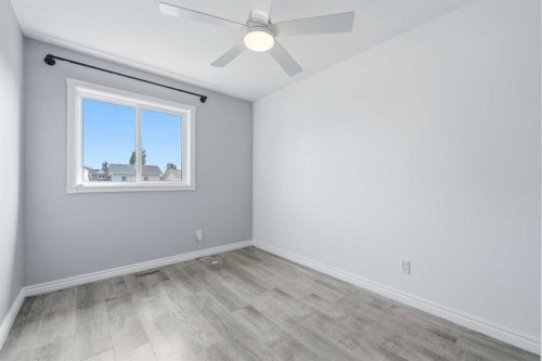 96 Rivercrest Crescent Se, Calgary, AB - Indoor Photo Showing Other Room