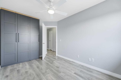 96 Rivercrest Crescent Se, Calgary, AB - Indoor Photo Showing Other Room