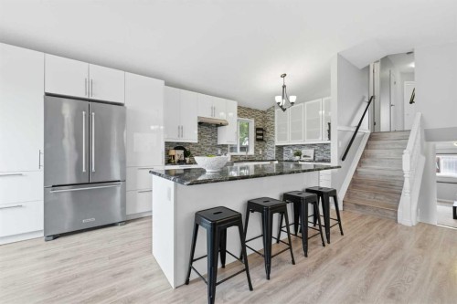 96 Rivercrest Crescent Se, Calgary, AB - Indoor Photo Showing Kitchen With Upgraded Kitchen