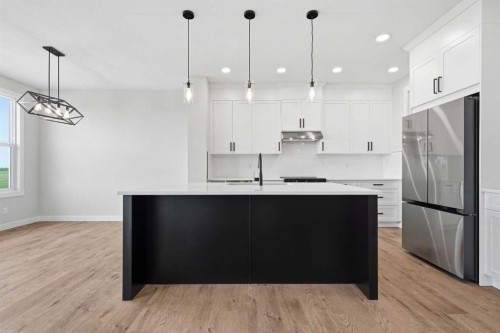 467 Kinniburgh Loop, Chestermere, AB - Indoor Photo Showing Kitchen With Upgraded Kitchen