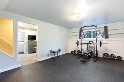 15 Southdale Bay Sw, Calgary, AB - Indoor Photo Showing Gym Room