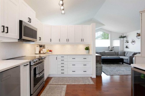 1105 Country Hills Circle Nw, Calgary, AB - Indoor Photo Showing Kitchen With Upgraded Kitchen