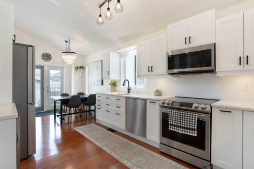 1105 Country Hills Circle Nw, Calgary, AB - Indoor Photo Showing Kitchen With Stainless Steel Kitchen With Upgraded Kitchen