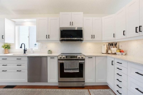 1105 Country Hills Circle Nw, Calgary, AB - Indoor Photo Showing Kitchen With Upgraded Kitchen