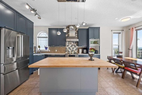 216 Tuscany Ridge View Nw, Calgary, AB - Indoor Photo Showing Kitchen With Stainless Steel Kitchen With Upgraded Kitchen