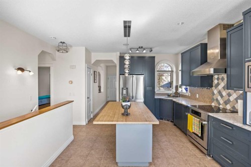 216 Tuscany Ridge View Nw, Calgary, AB - Indoor Photo Showing Kitchen With Stainless Steel Kitchen With Upgraded Kitchen