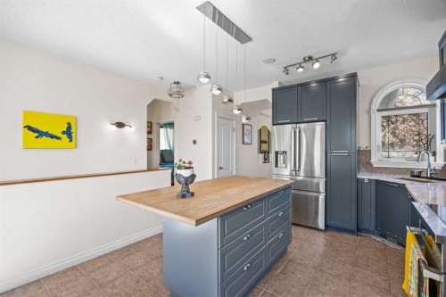 216 Tuscany Ridge View Nw, Calgary, AB - Indoor Photo Showing Kitchen With Stainless Steel Kitchen