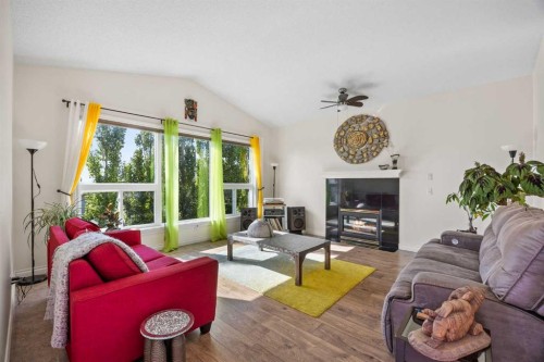216 Tuscany Ridge View Nw, Calgary, AB - Indoor Photo Showing Living Room