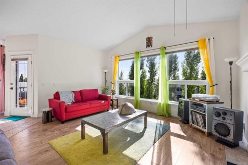 216 Tuscany Ridge View Nw, Calgary, AB - Indoor Photo Showing Living Room