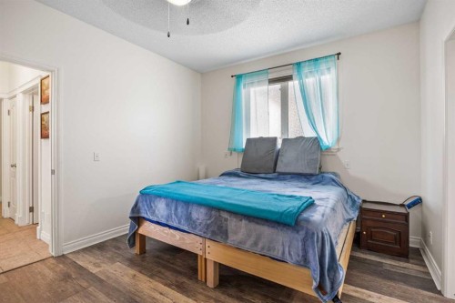 216 Tuscany Ridge View Nw, Calgary, AB - Indoor Photo Showing Bedroom