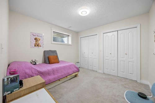 216 Tuscany Ridge View Nw, Calgary, AB - Indoor Photo Showing Bedroom