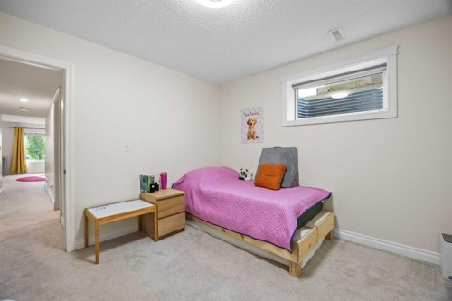 216 Tuscany Ridge View Nw, Calgary, AB - Indoor Photo Showing Bedroom