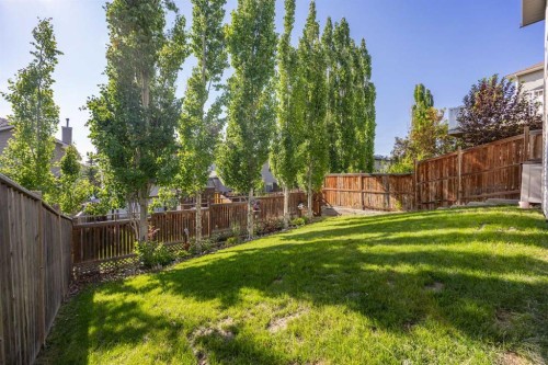 216 Tuscany Ridge View Nw, Calgary, AB - Outdoor With Backyard