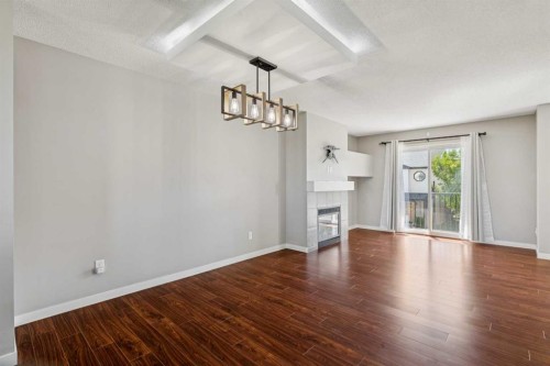 409 Copperpond Landing Se, Calgary, AB - Indoor With Fireplace