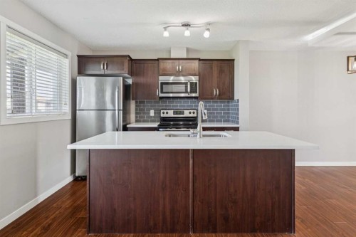 409 Copperpond Landing Se, Calgary, AB - Indoor Photo Showing Kitchen