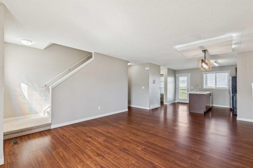 409 Copperpond Landing Se, Calgary, AB - Indoor Photo Showing Living Room